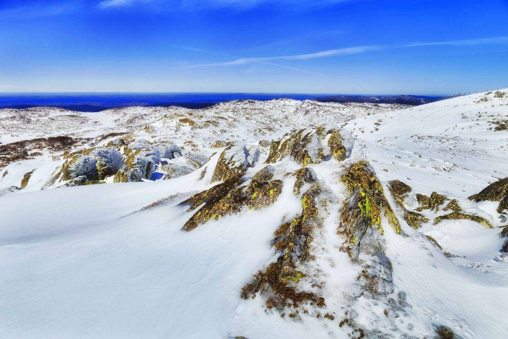  "Snow-covered landscape of Perisher Valley, a premier skiing destination in the Australian Alps."
