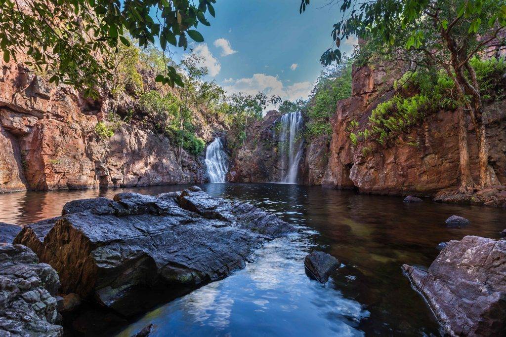 "The tranquil Florence Falls in Litchfield National Park, a popular destination for nature lovers."