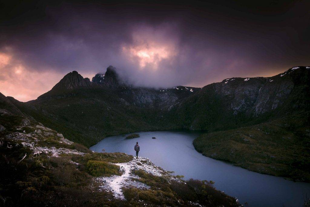 "Iconic Cradle Mountain looming over the serene Dove Lake."