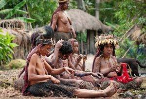 Tribal ladies doing their daily chores